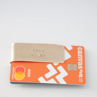 Cash Money money clip close-up