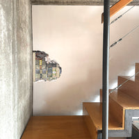 fake money decal in stair case hallway