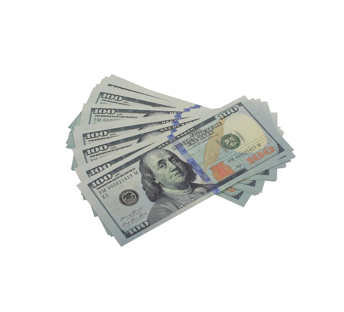 front of fake money for play and movies single 100 bills