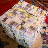 top of a coffee table top look like lots of money stacks