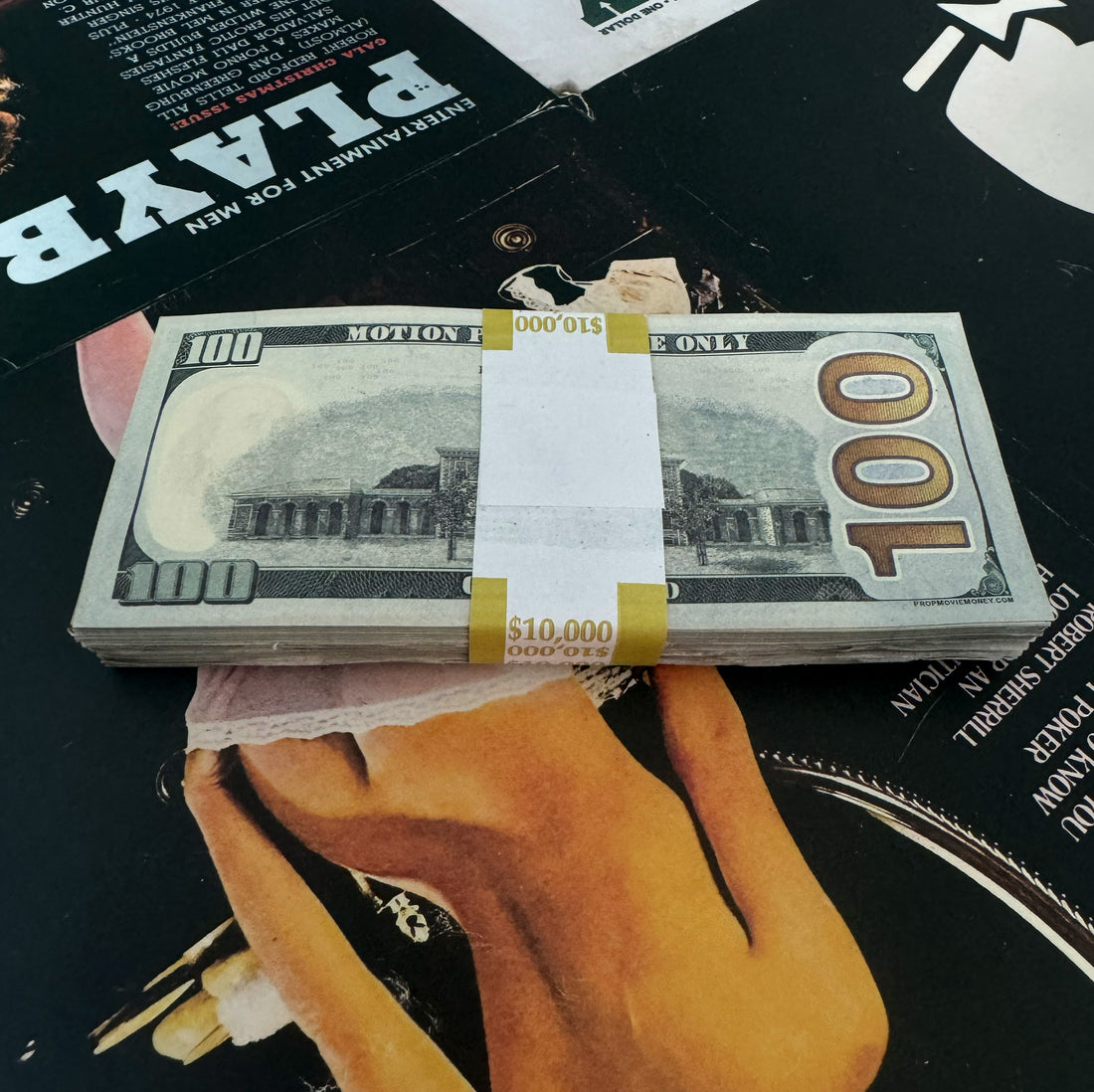 back side of fake money with bank strap