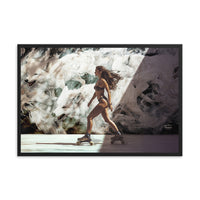 woman roller blading in new york city in front of a white wolf mural art