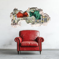 A wall decal featuring a stylized red bull and green bear emerging from a depiction of a broken wall, placed above a red armchair.