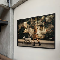 wall art of a woman walking with a white wolf