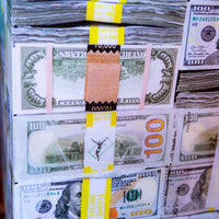 side view of stacks of money with sticker bank straps