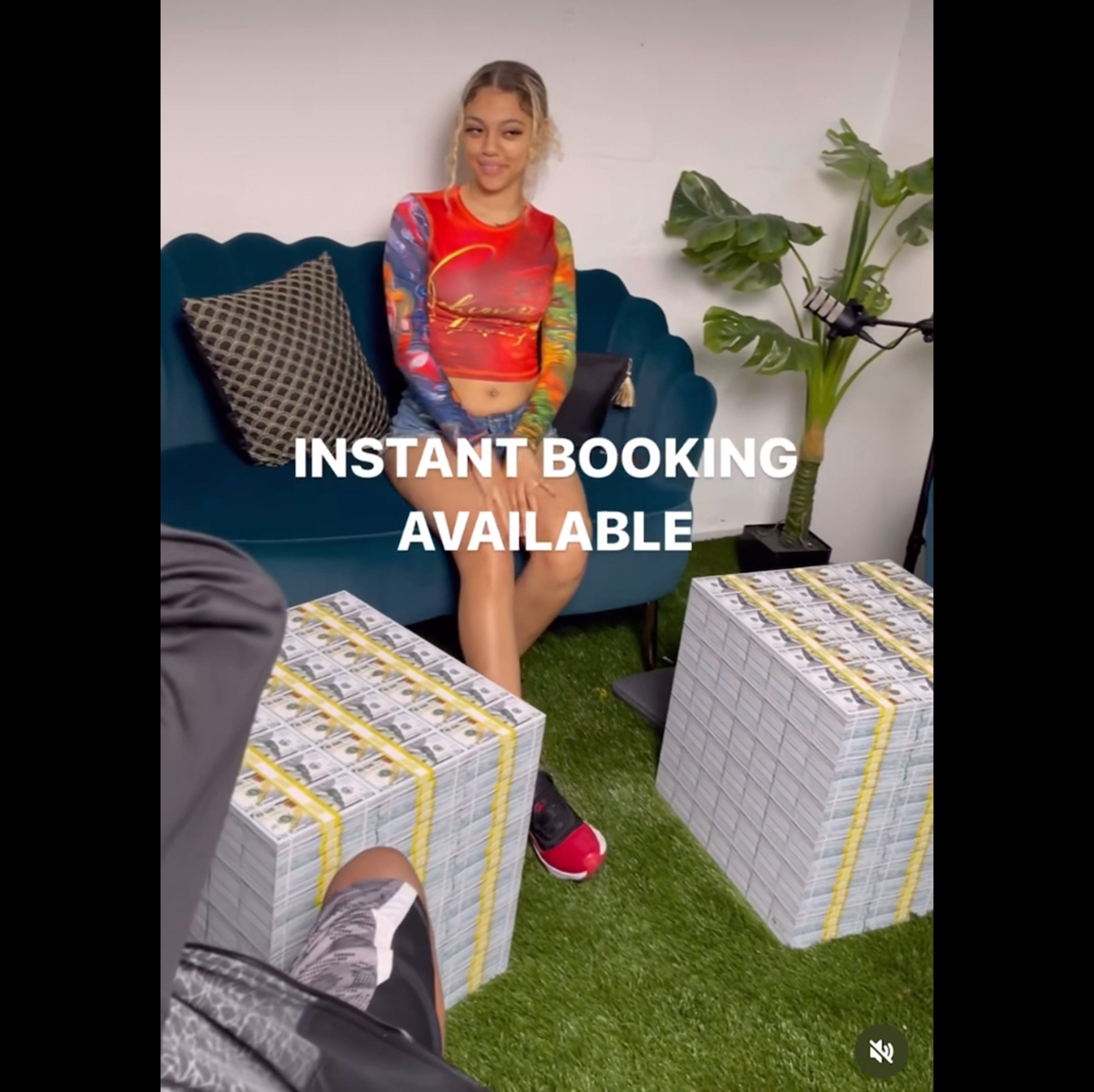 woman with two money tables and a photoshoot booking 