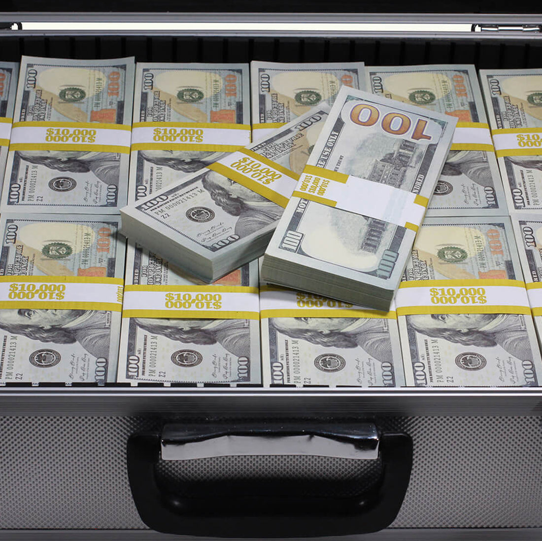 Narco Display – $750K Money Stacks with Silver Briefcase
